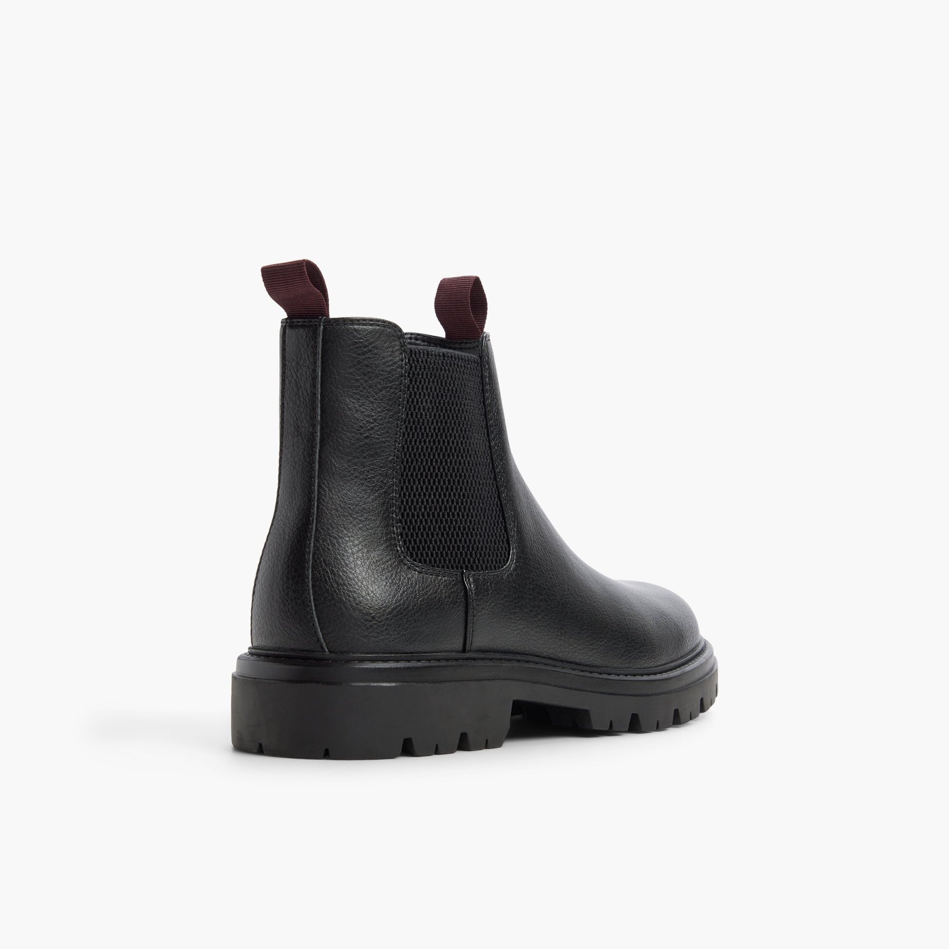Angle de trois quarts de l'arrière de Noir Defender Bottes Chelsea