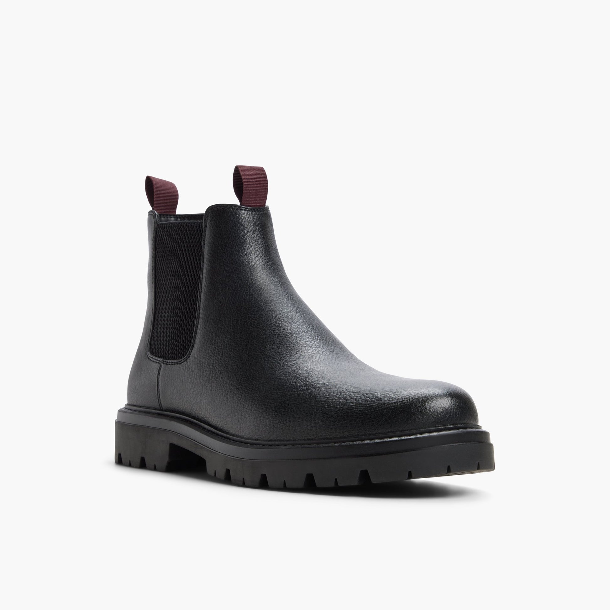 Angle de trois quarts de la face avant de Noir Defender Bottes Chelsea