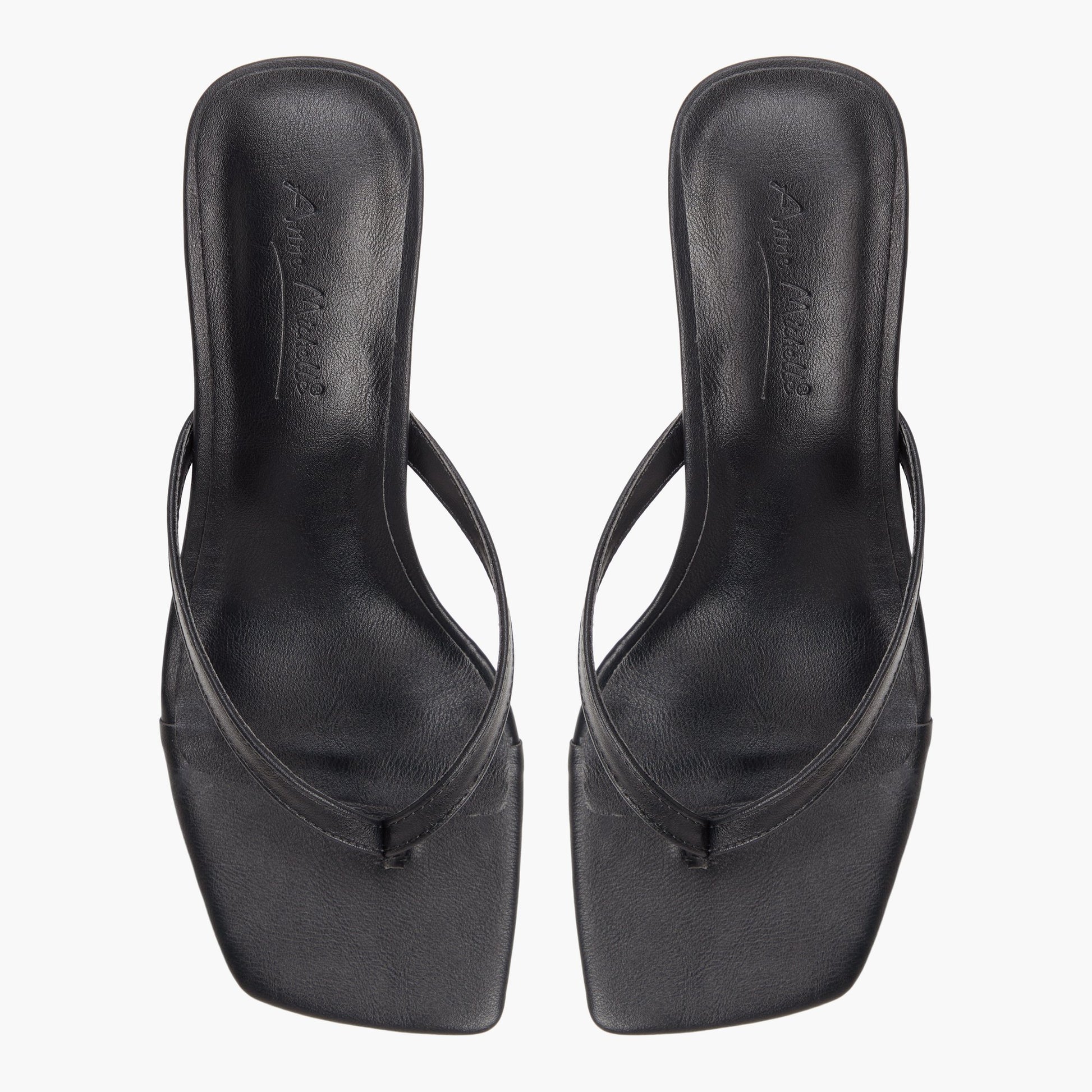 Top-down view of the Black Luxa Heeled Thongs
